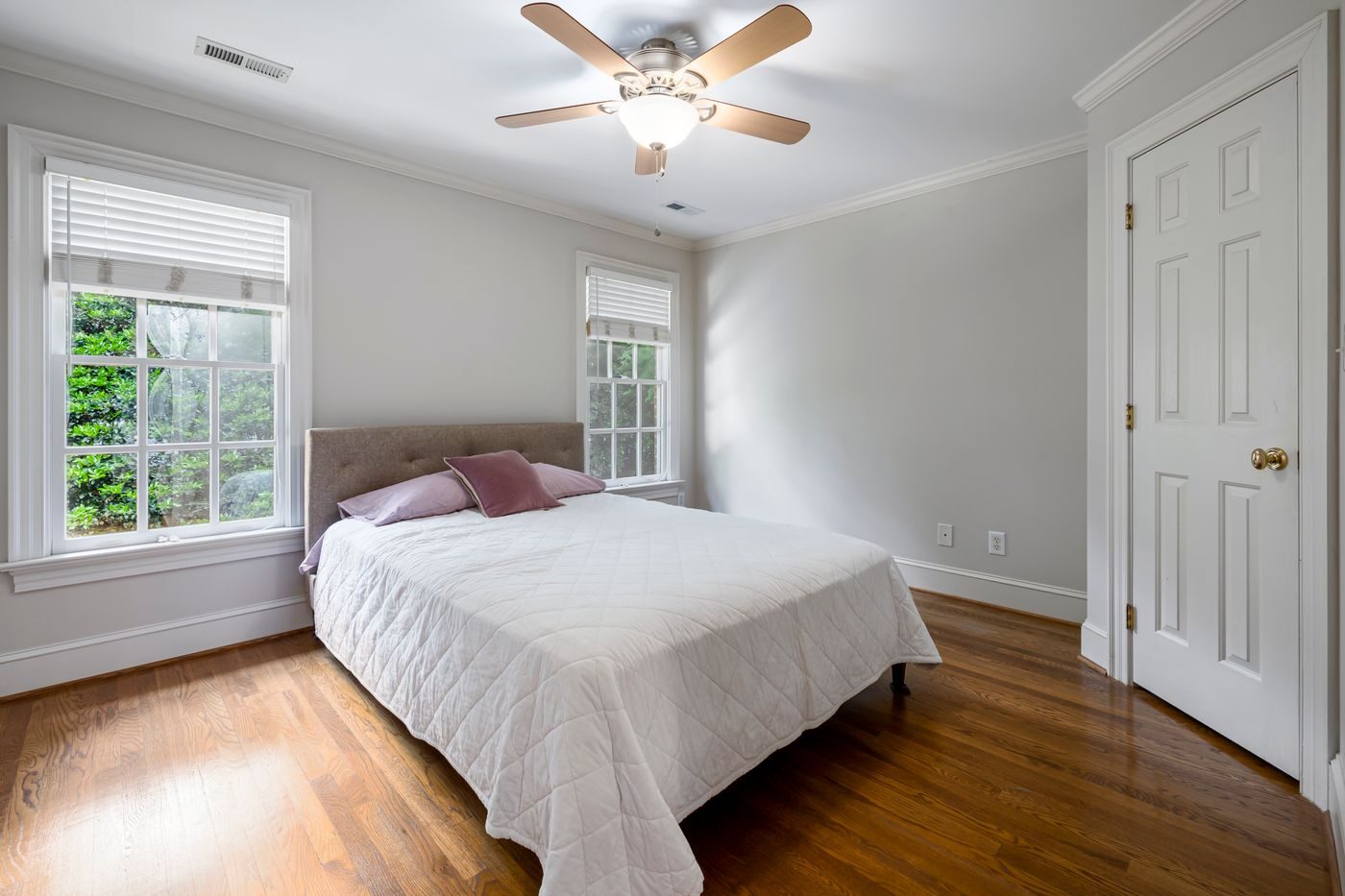 A calm, dawn-lit bedroom